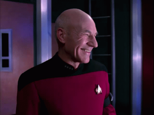 captain-picard-laughing.gif